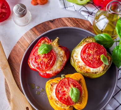 Colourful bell peppers stuffed with spelt groats