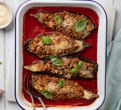 Aubergine stuffed with minced meat in tomato sauce